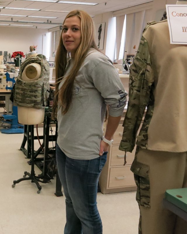 Annette LaFleur, the team leader of Natick's Design, Pattern and Prototype Team, next to a prototype sniper uniform (which the Army ended up not using).